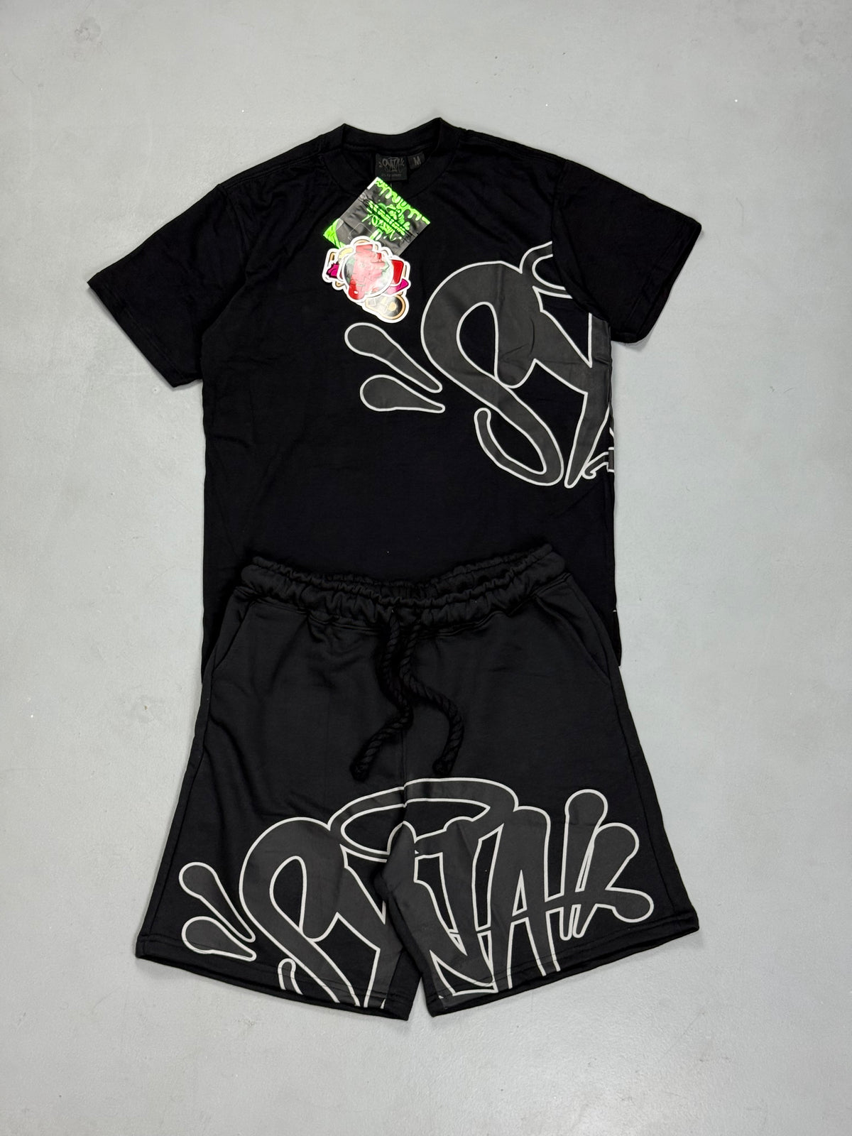 CONJUNTO SYNA WORLD LOGO